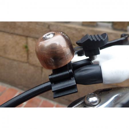 Installed mini brass bell